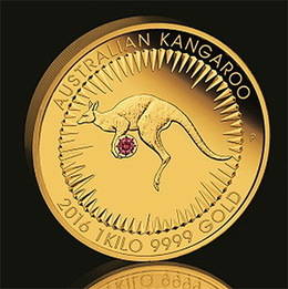 Una moneda de oro de 1 kilo con diamante rojo incrustado